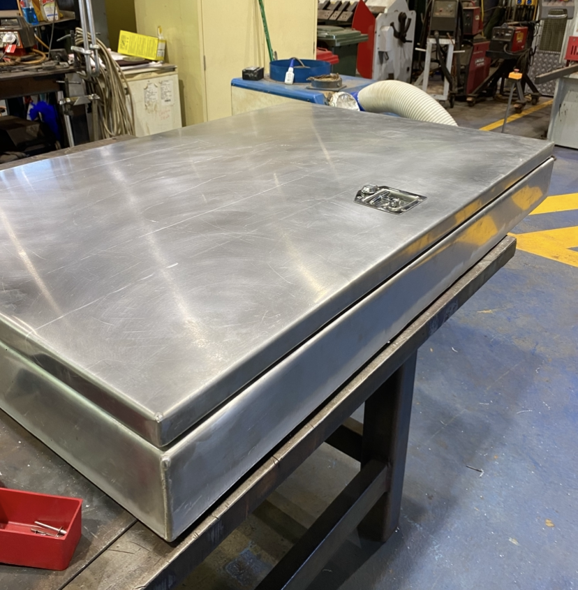 Aluminium enclosure with sealed lid and latch in the Cerberus workshop