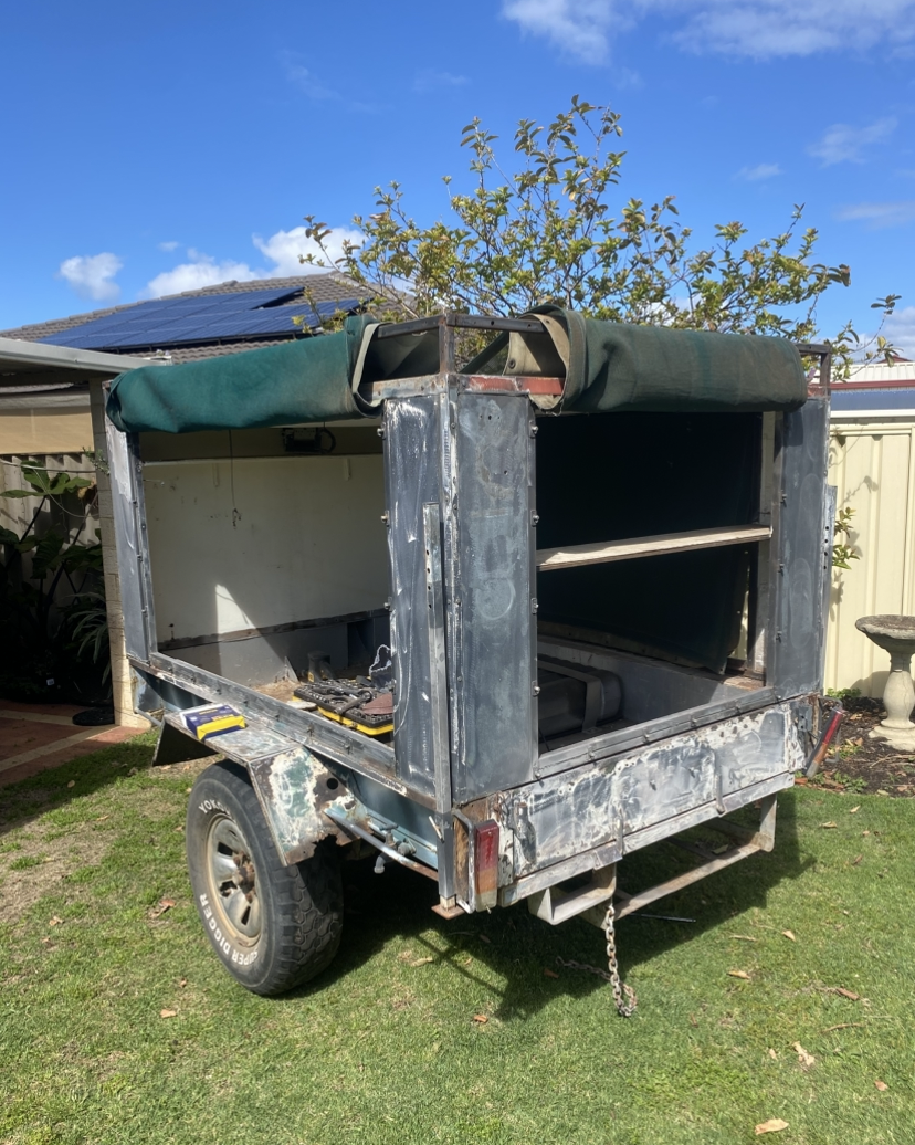 Old worn trailer before Cerberus rebuild