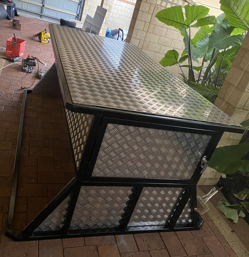 Aluminium checker plate canopy storage box with hinged side access