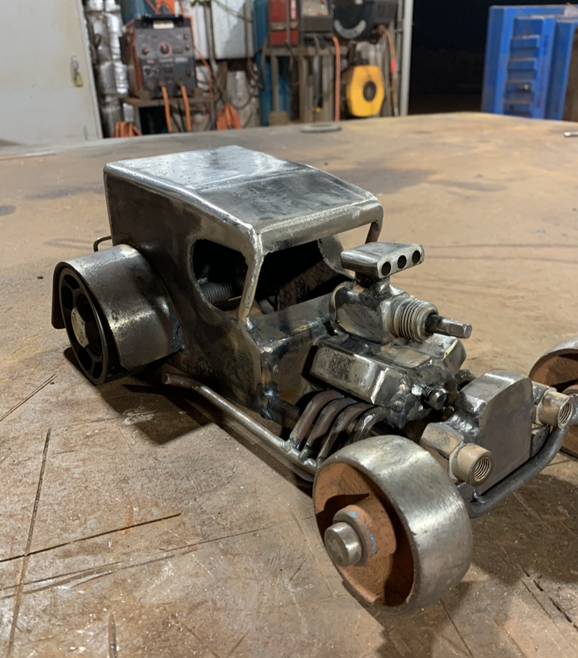 Hand fabricated hot rod metal art sculpture built from off-cuts